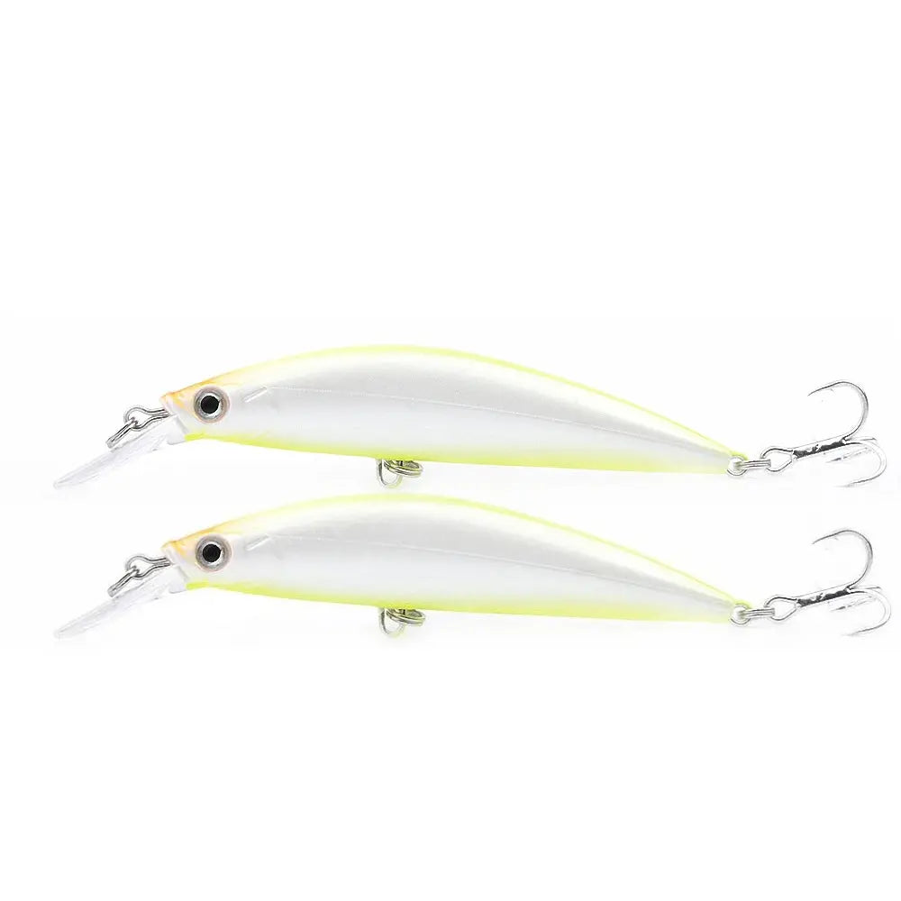 Two fishing lures with a white and yellow design on a white background
